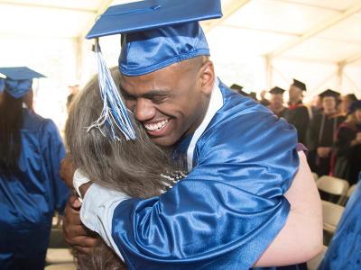 graduate hug