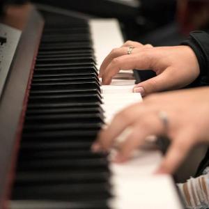 AACC student practices piano.