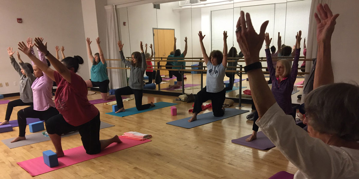 AACC students participating in yoga.