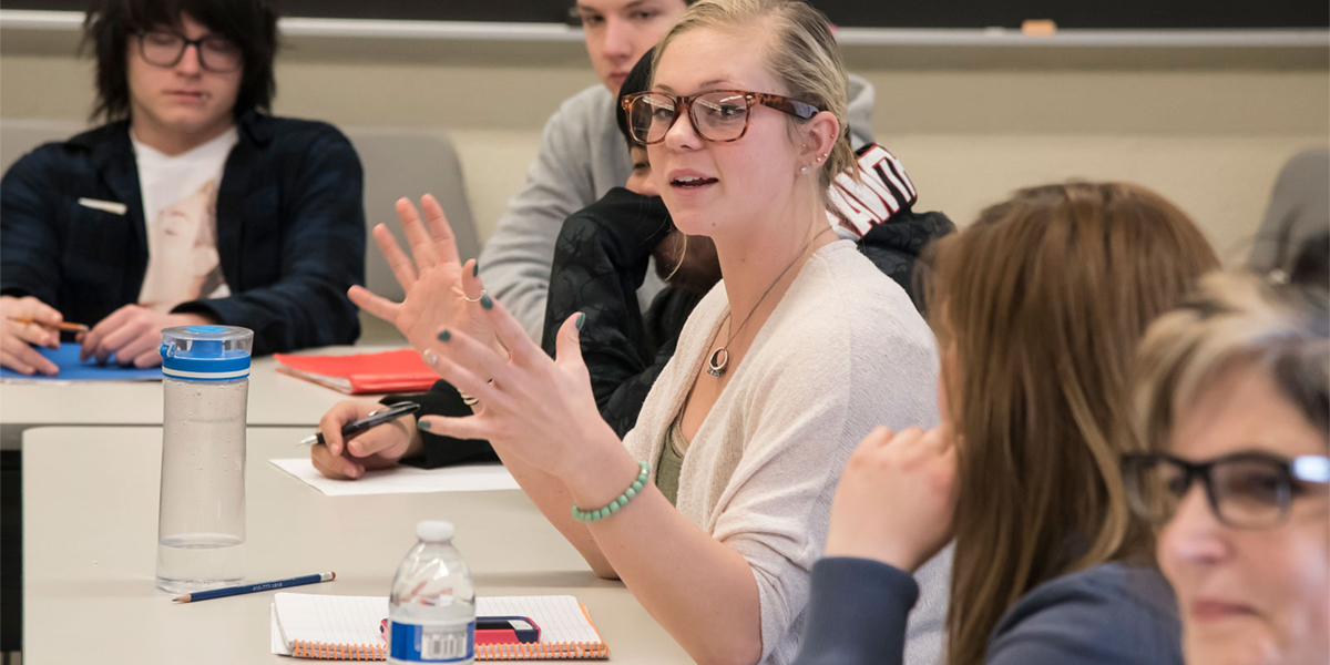 Female student in class discussion