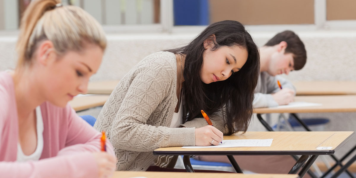 Students taking a test in a classroom.